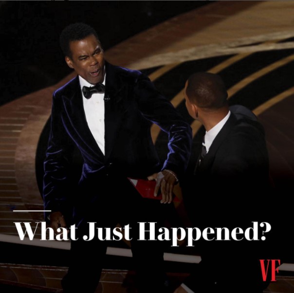 ステージでクリスを平手打ちしたウィル（画像は『Vanity Fair　2022年3月27日付Instagram「At Sunday night’s ＃Oscars ceremony, Best Actor nominee ＃WillSmith shocked the room by approaching the stage and slapping presenter ＃ChrisRock in the face after the comedian made a joke about Smith’s wife, actress Jada Pinkett Smith.」』のスクリーンショット）