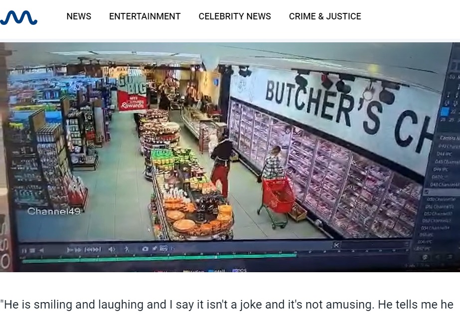 女児を抱っこして連れ去る男（画像は『MEAWW　2022年8月25日付「Shocking video show store employee ‘snatching’ baby after mother turns her back for SECONDS」（Danielle Wolff/Facebook）』のスクリーンショット）