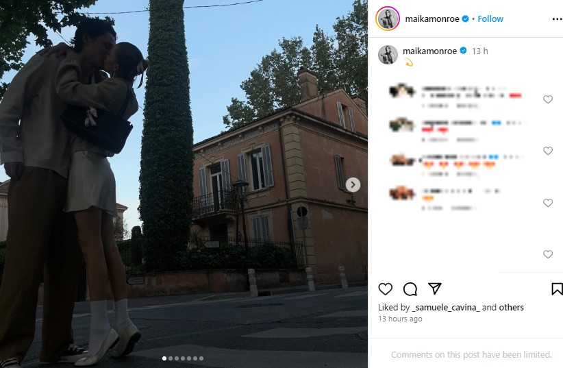 住宅街の通りでキスを交わすダルトンさんとマイカ。マイカはつま先立ちで、ダルトンさんの肩に腕を回している（『Maika Dillon Monroe　Instagram』より）